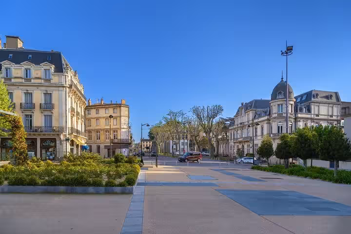 Scenic view of Carcassonne's charming city streets with elegant historical architecture.
