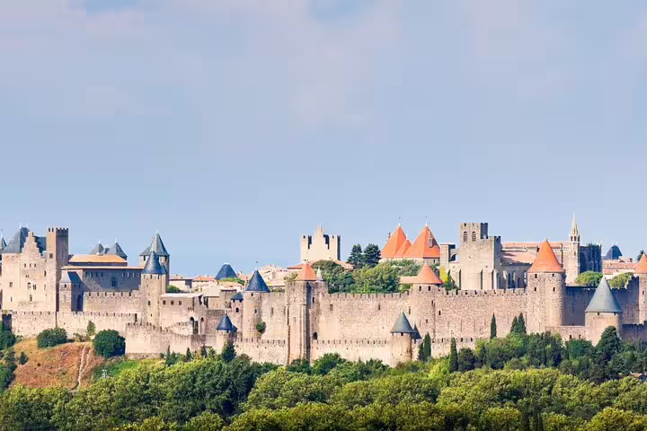 Panoramic view of Carcassonne walled city skyline, must-see stops on a self-guided scavenger hunt tour