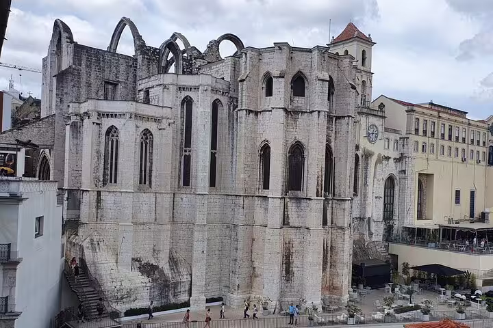 Gothic ruins of Carmo Convent in Lisbon's Old Town, a highlight of the private half-day tour featuring Belem and New Town.