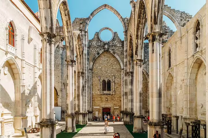 Explore the striking ruins of the Carmo Convent in Lisbon, a must-see stop on the Lisbon Highlights for Newcomers Private Tour.