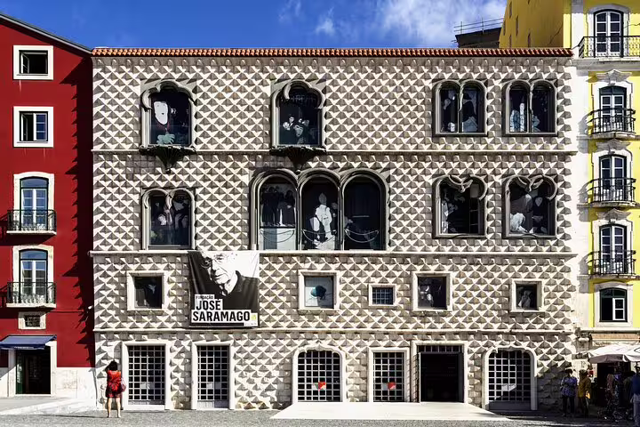Unique architectural facade of Casa dos Bicos in Lisbon, featured on "Lisbon Like a Local Private Tour" for an authentic experience.