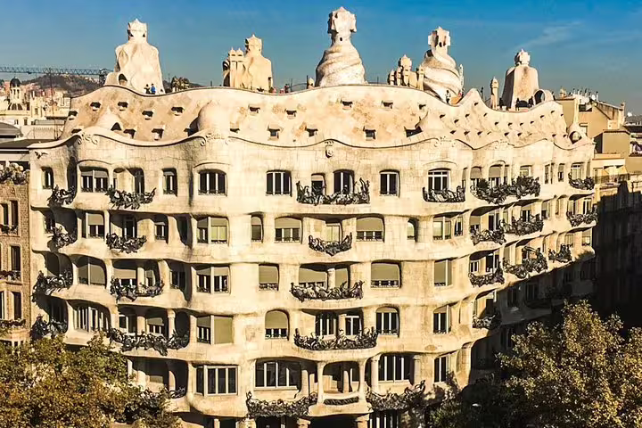 Unique Gaudí architecture of Casa Milà in Barcelona, featured on a private tour with Sagrada Familia, Park Güell, and tapas.