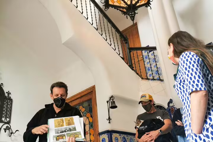Visitors explore Casa Vicens on a guided private tour, enjoying skip-the-line access to Colonia Güell's architectural marvels.