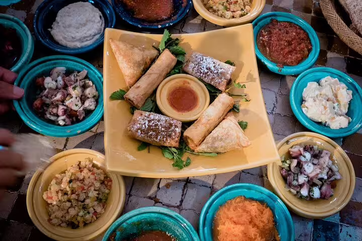 Moroccan mezze and pastries served in Casablanca, tasting local flavors on a private Casablanca day trip food stop