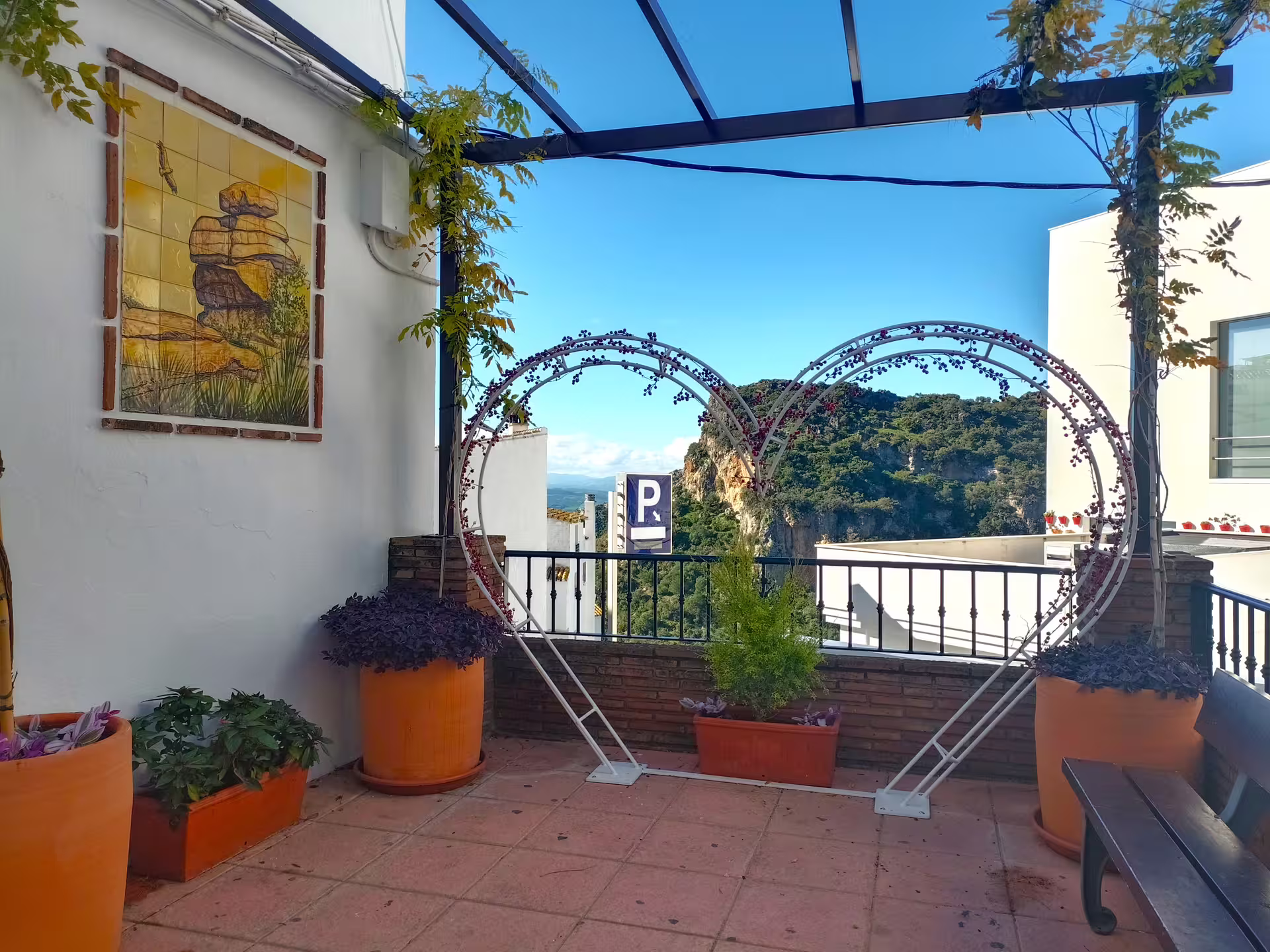 Casares viewpoint terrace with heart-shaped frame and mountain views on a private tour from Costa del Sol