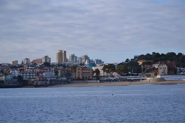 Bay of Cascais with marina and city skyline from a private sailing cruise, half-day or full-day on the Atlantic