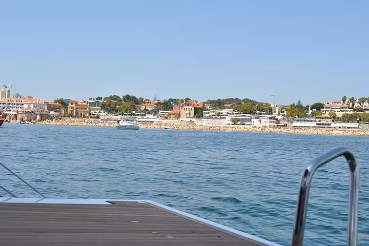 View of Cascais waterfront from a private sailing boat, Atlantic sea breeze on a 2-hour cruise with drinks included