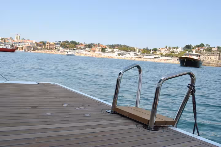 Yacht swim ladder on deck in Cascais bay during private 2-hour sailing cruise with drinks on the Atlantic coast