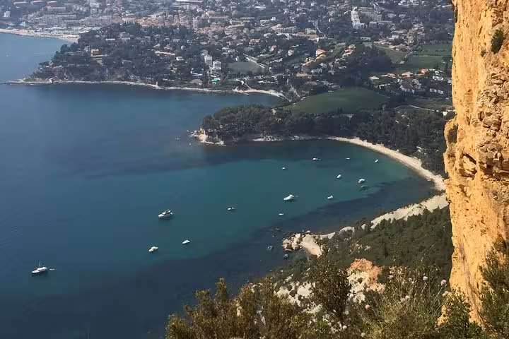 Panoramic view of Cassis coastline and turquoise calanques, a scenic stop on Bandol wine tour from Provence
