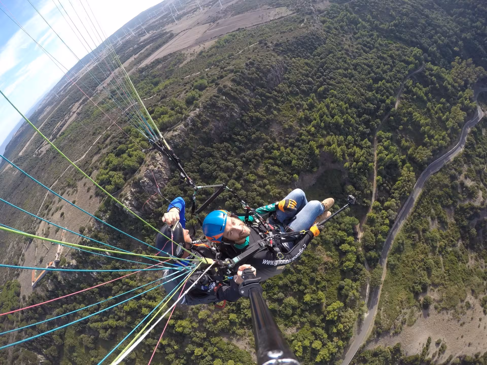 Soar high above Littigheddu's lush landscapes on an exhilarating tandem paragliding adventure in Castelsardo.