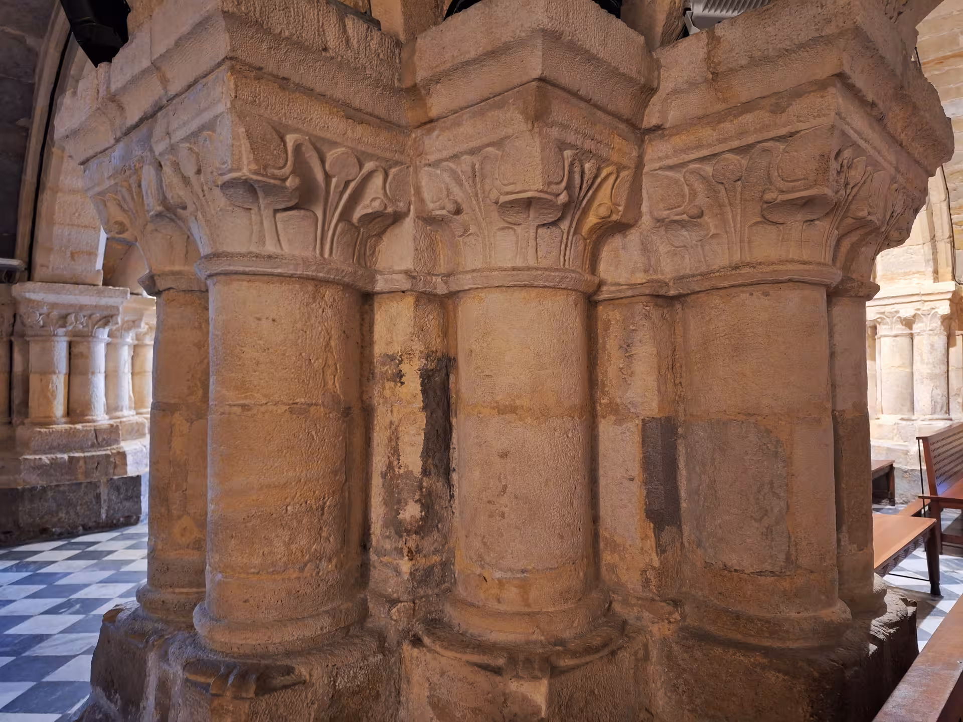 Detailed stone columns inside Cathedral of Santander showcasing Gothic architecture on a guided visit.