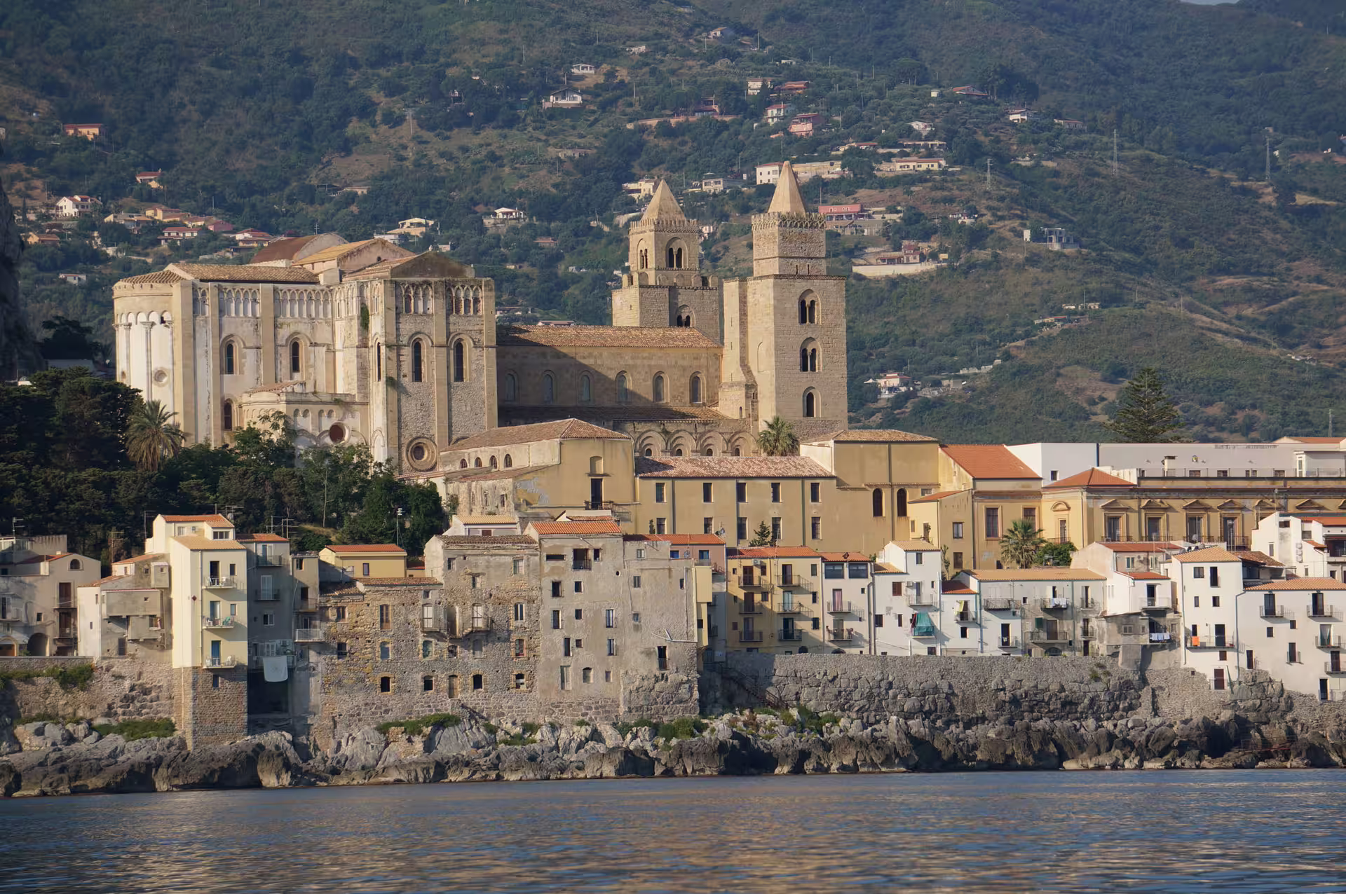 Cefalù Cathedral and old town waterfront, Sicily, on a Cefalù and Castelbuono day tour with wine option
