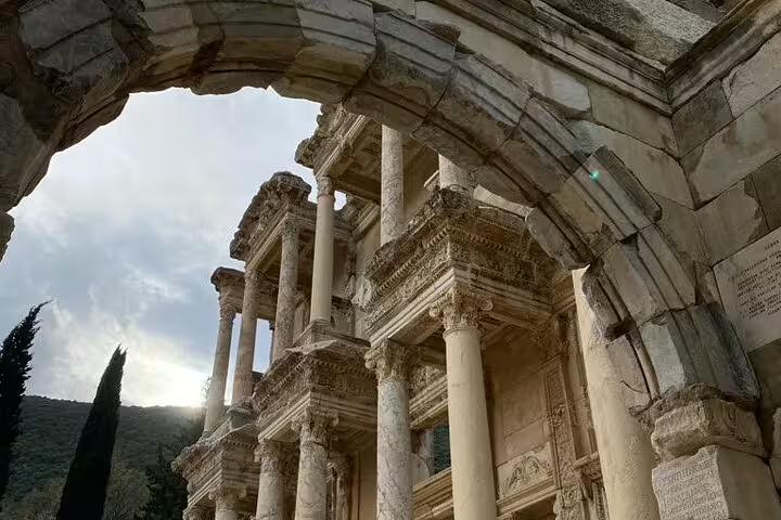 Celsus Library facade framed by arch in Ancient Ephesus on private tour with St John Basilica and lunch