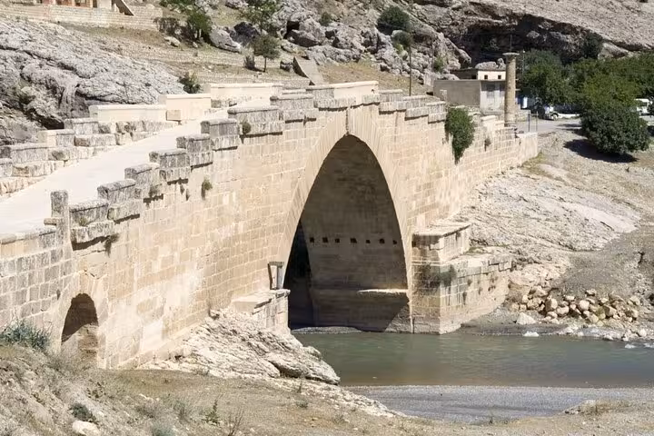 Historic Cendere Bridge stone arch near Adiyaman, visited on Mount Nemrut and Gobekli Tepe 2-day tour