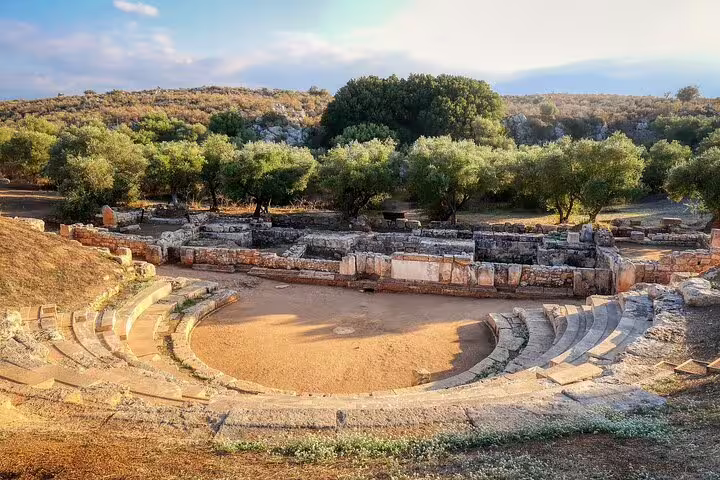 Explore the ancient amphitheater surrounded by lush greenery on the Chania private tour from Rethymno.