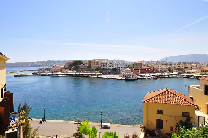 Panoramic view of Chania harbor and blue sea, Crete, featured on the Apokoronas 7 villages tour with olive oil tasting