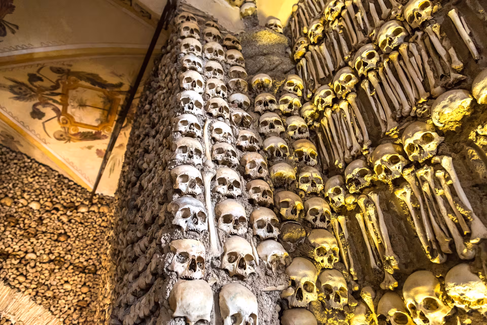Discover the Chapel of Bones in Évora, adorned with human skulls and bones, on a private guided city tour from Lisbon.