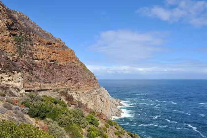 Chapman’s Peak Drive cliffs above the Atlantic Ocean on a Cape Peninsula full-day tour from Cape Town