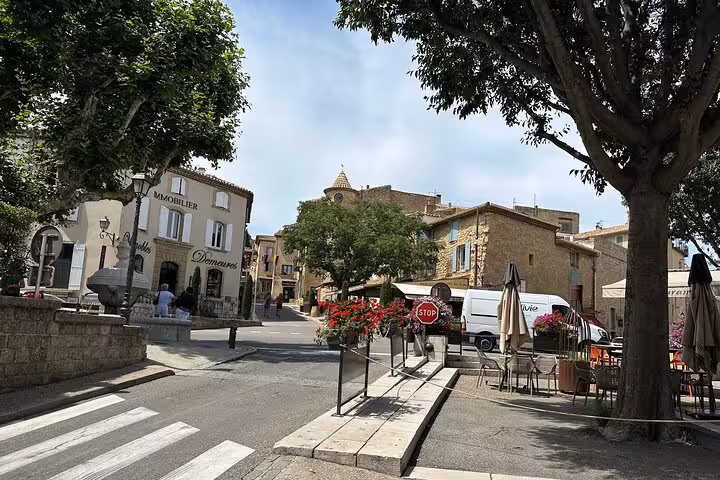 Charming Châteauneuf-du-Pape village square near Avignon, stop on a full private day wine tasting tour