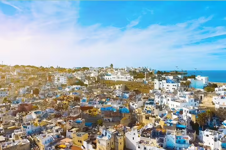 Panoramic view of Chefchaouen blue city rooftops, a highlight on Morocco 12 days tour from Tangier