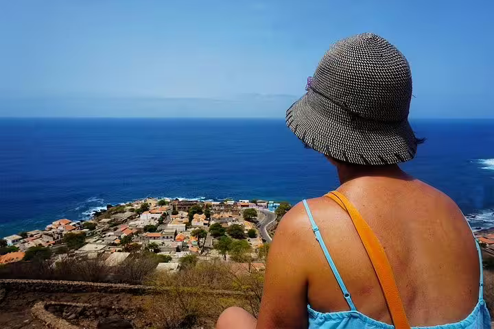 Traveler overlooks Cidade Velha coastline near Praia, Cabo Verde, on a 3-hour guided historic tour