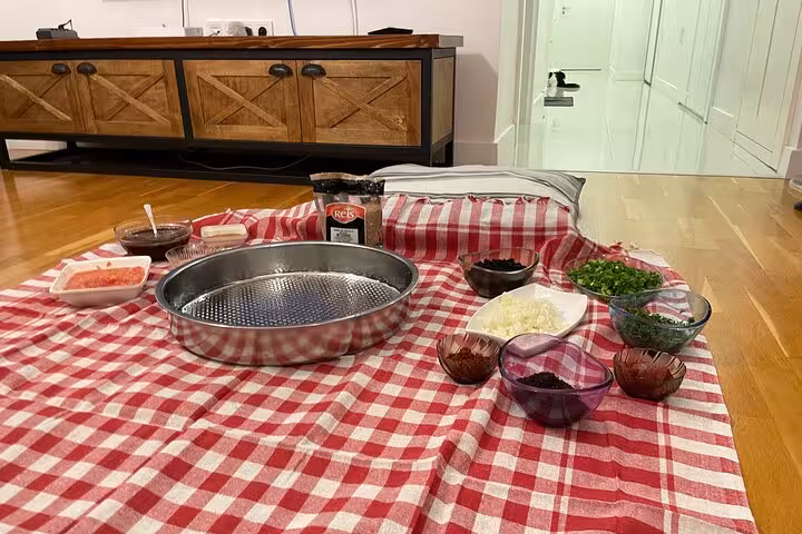 Ingredients set for Turkish çiğ köfte cooking class at home, ready for traditional music night experience