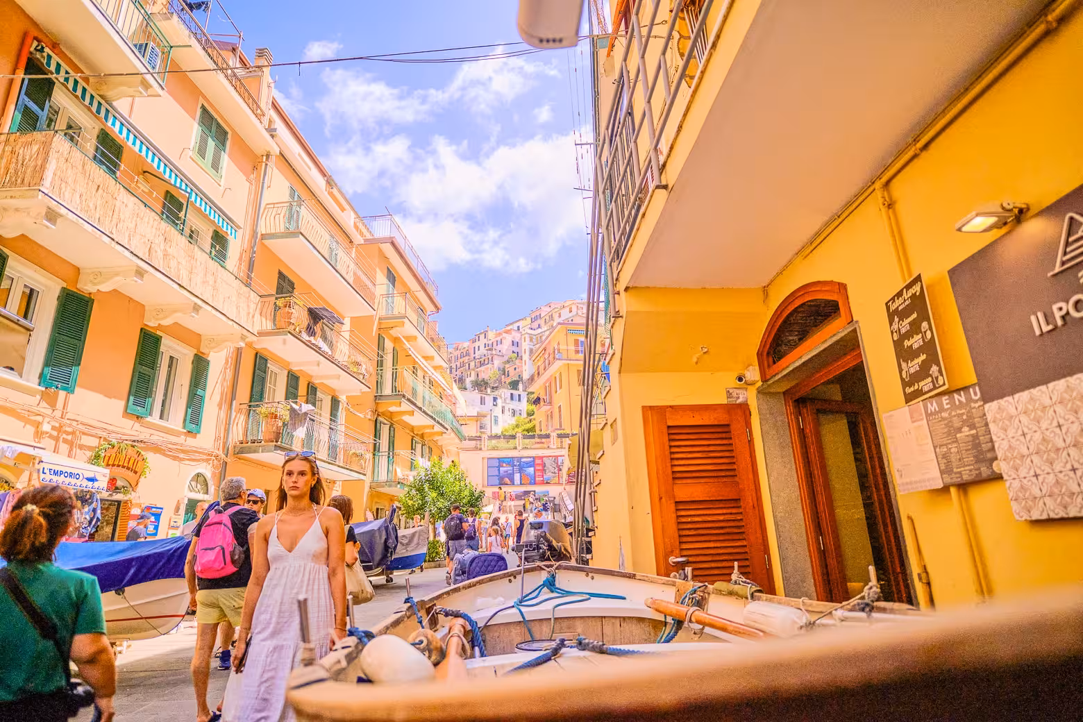 Vibrant street scene in Cinque Terre with colorful buildings, perfect for a full-day tour from Florence.