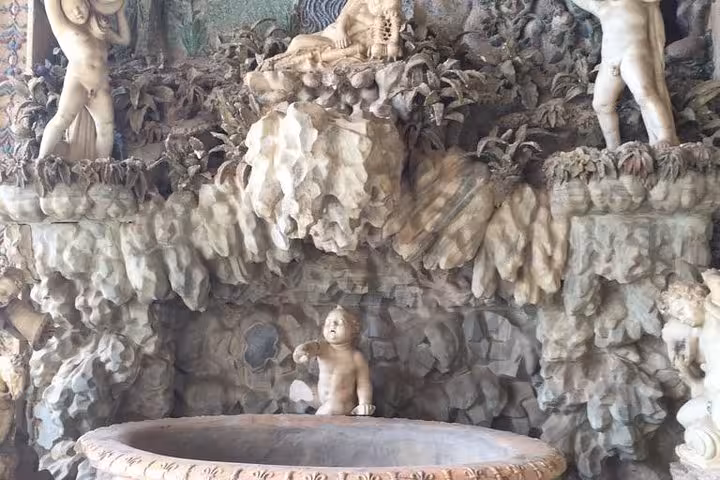 Intricate stone carvings in Civita di Bagnoregio showcasing ancient art on a private tour with wine tasting and lunch.