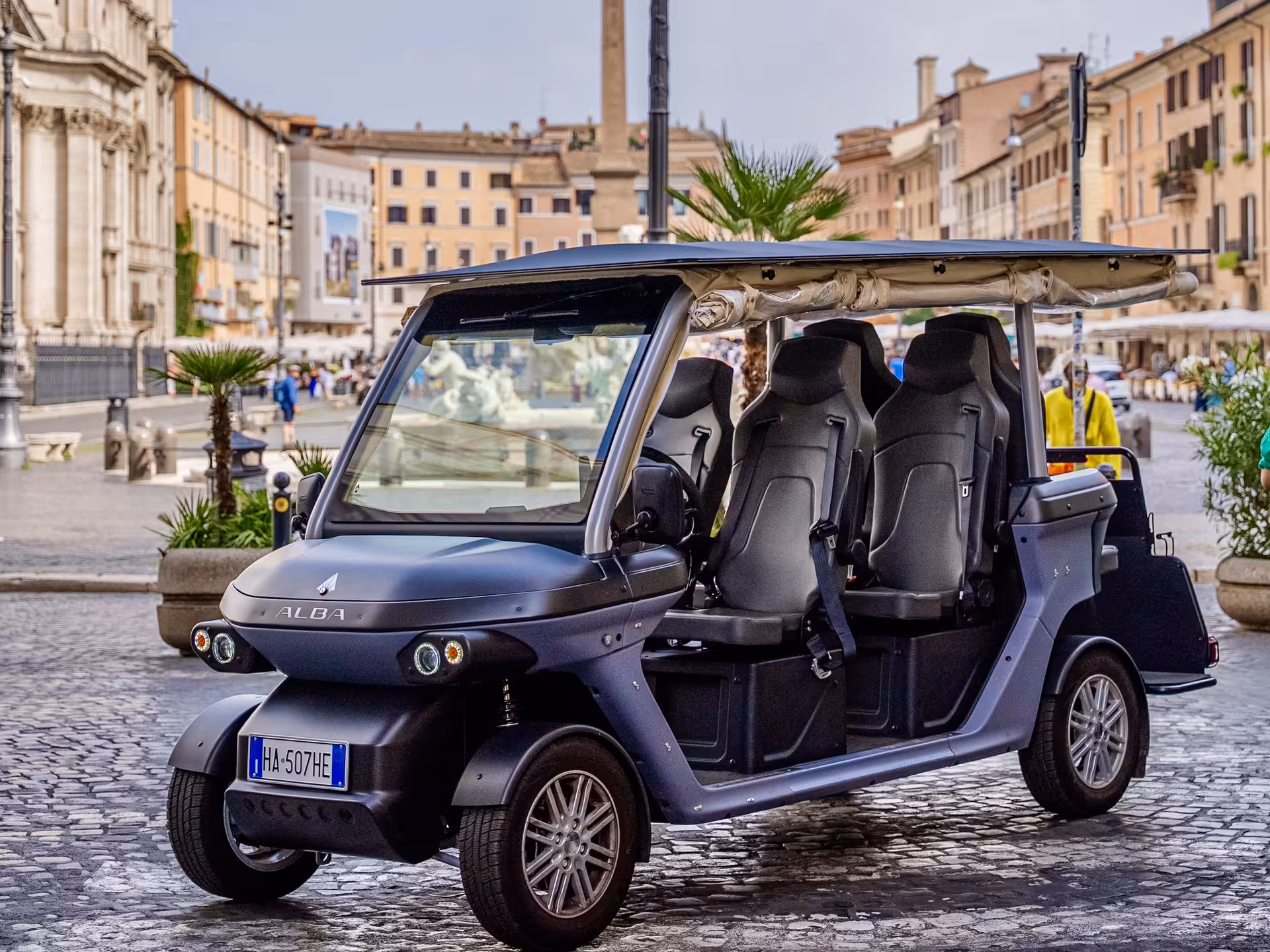 Luxury electric golf cart parked in historic Rome square for Civitavecchia to Rome VIP shore excursion and city tour