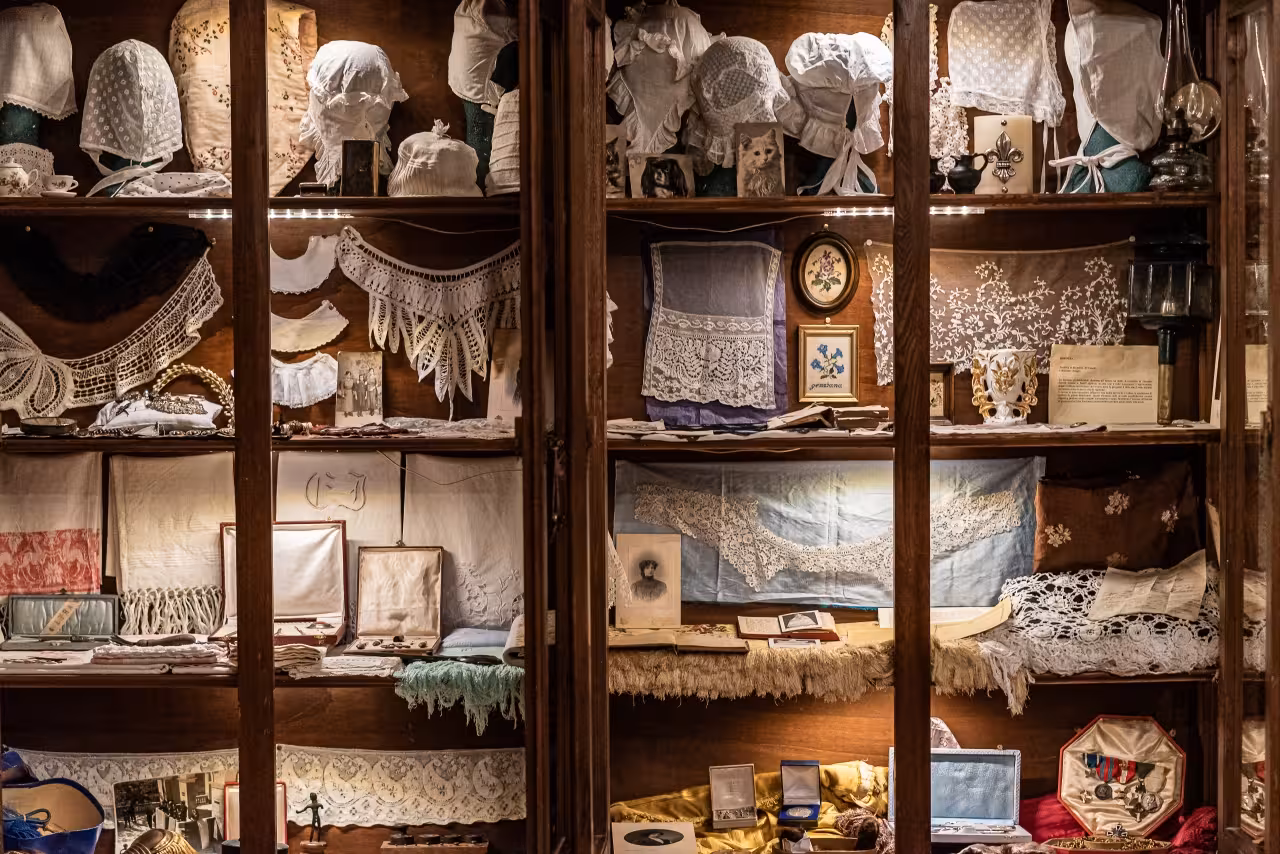 Lace linens and historic textiles exhibit in the NINA Museum at Civitella del Tronto fortress entrance ticket