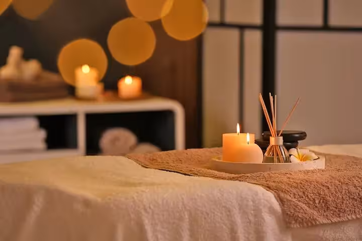Relaxing massage room with candles and diffuser set up for Cleopatra’s Luxury Spa & Massage Experience in Sharm El Sheikh