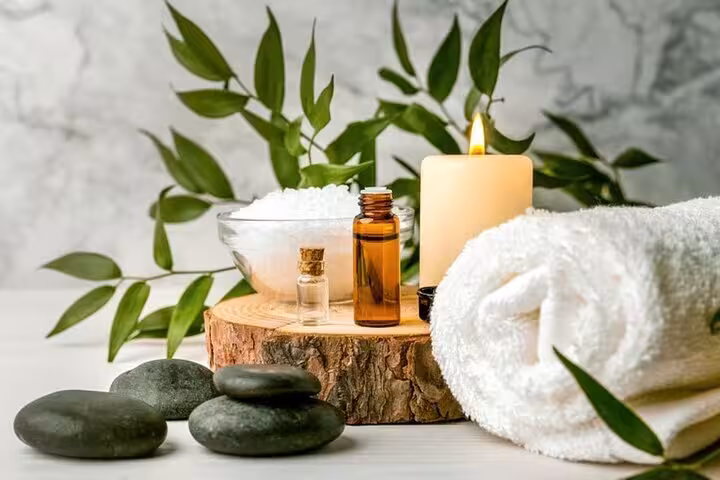 Spa essentials with oils, sea salt, hot stones and towel for Hurghada Cleopatra Spa bath experience