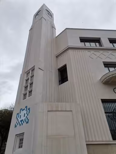 Clock tower facade in Marseille near Le Panier, a landmark stop on the oldest neighbourhood walking tour