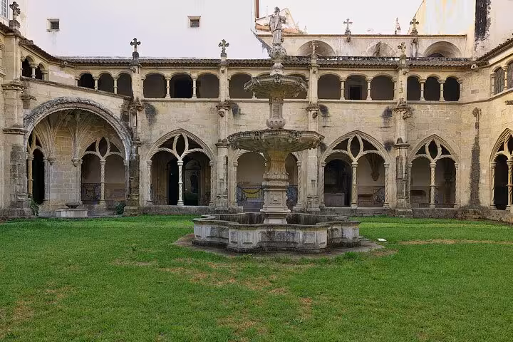 Discover the serene cloisters of Coimbra with a private walking tour, highlighting its Gothic architecture and tranquil gardens.