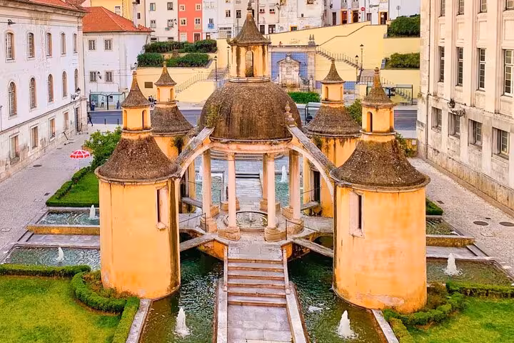 Capture of Coimbra's enchanting Jardim da Manga, showcasing its intricate architecture and serene water features.
