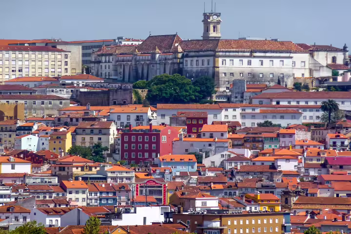 Panoramic view of Coimbra's historic University district with vibrant rooftops, perfect for a private tour exploring Portuguese heritage.