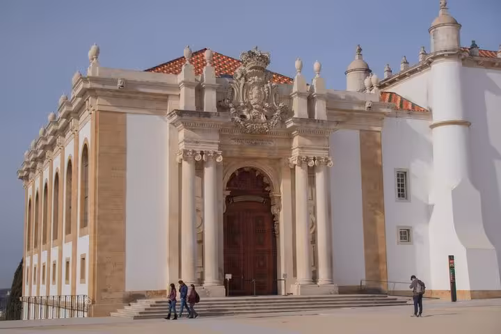 Explore the stunning architecture of the University of Coimbra on a private walking tour with tickets included.