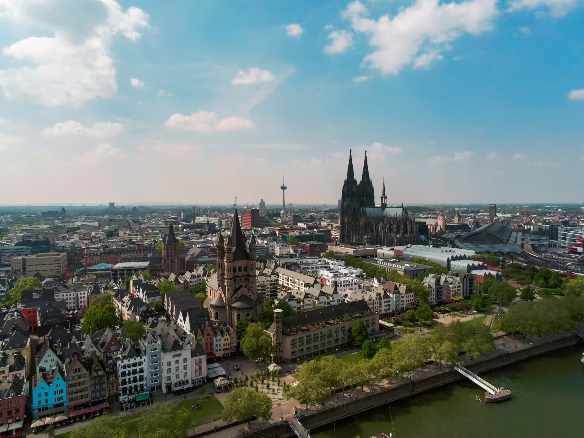 Aerial view of Cologne old town, Rhine River and Cologne Cathedral, ideal for 1-day walking tour audioguide