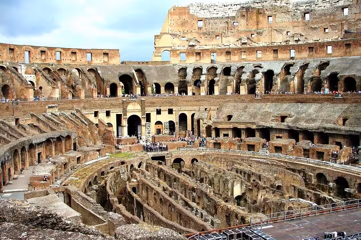 Colosseum interior and underground hypogeum view on private arena tour, Rome gladiator battleground access