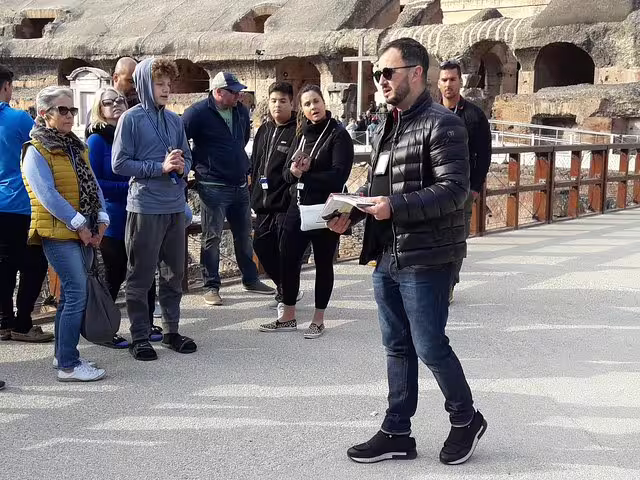 Expert guide leading a small-group Colosseum arena floor tour, explaining gladiator history inside Rome’s ancient amphitheatre