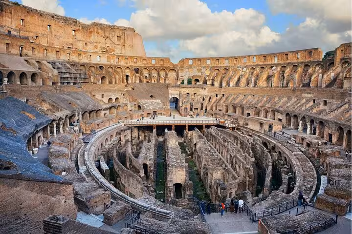Interior view of the Colosseum's ancient architecture, a key highlight of the Colosseum and Vatican guided tour.