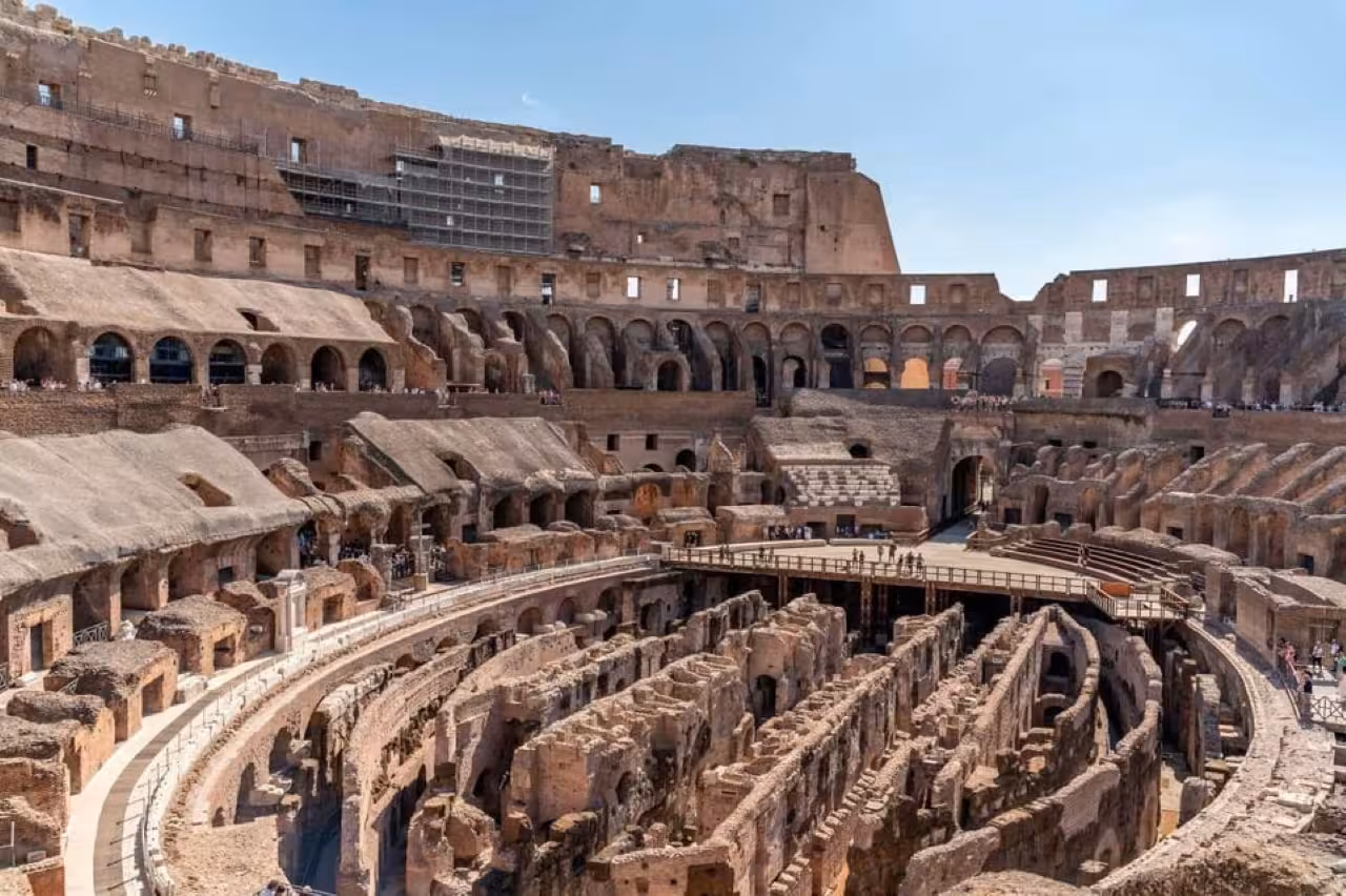 Discover the iconic Colosseum interior in Rome, showcasing ancient Roman engineering and historical significance.