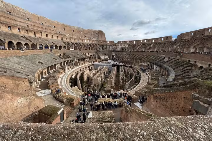 Inside view of the Colosseum amphitheater showcasing ancient architecture during a guided private tour.
