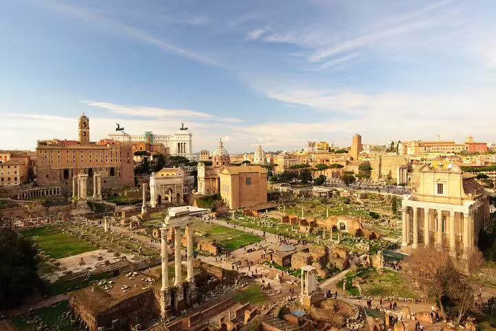 Panoramic view of the Roman Forum near the Colosseum, visited on a private guided tour with arena floor access in Rome