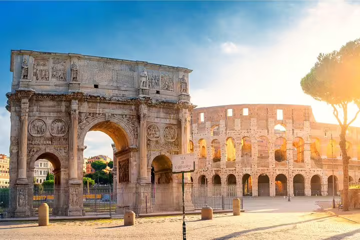 Sunrise over the Colosseum and Arch of Constantine in Rome, starting point for 2-day Colosseum and Vatican tour
