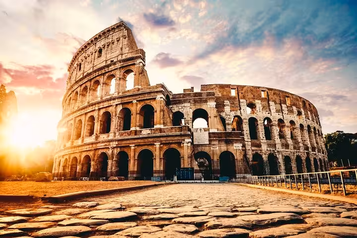 Explore the grandeur of the Colosseum at sunrise on our Colosseum + Vatican Museums and Sistine Chapel Guided Tour.