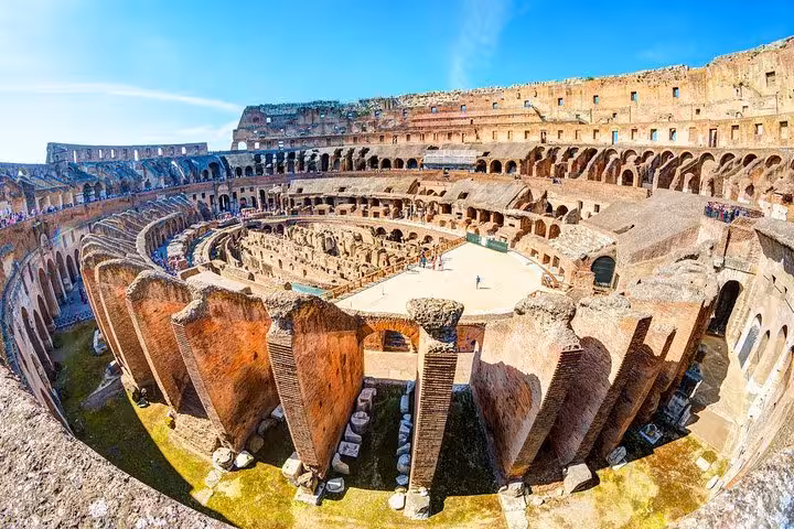 Experience a panoramic view of the Colosseum's ancient amphitheater, showcasing its grandeur and historical significance.