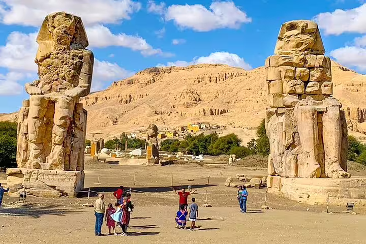 Colossi of Memnon statues in Luxor on Valley of the Queens day tour by bus from Hurghada, Egypt