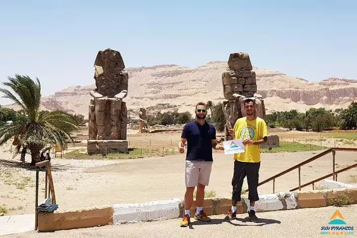 Visitors at Colossi of Memnon, Luxor on 15 days 14 nights Holy Family Tour in Egypt with private guide
