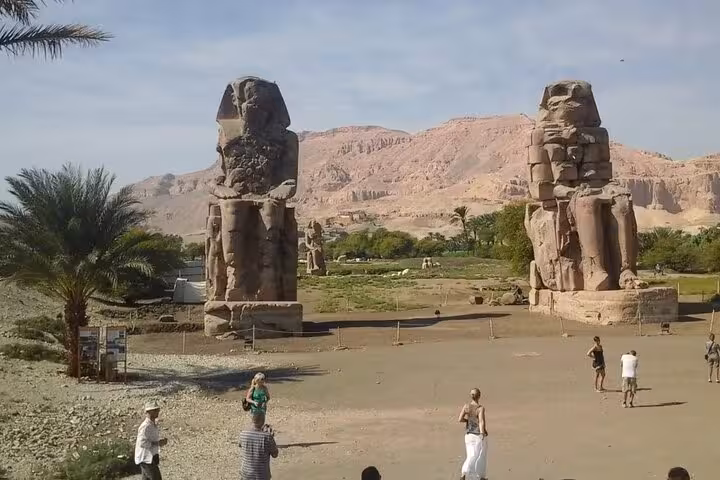 Colossi of Memnon statues on Luxor West Bank, visited on a full-day Valley of the Kings trip